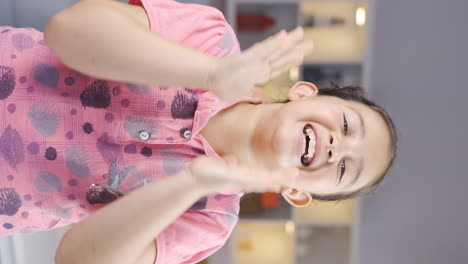 Vertical-video-of-Girl-child-clapping-excitedly-to-camera.